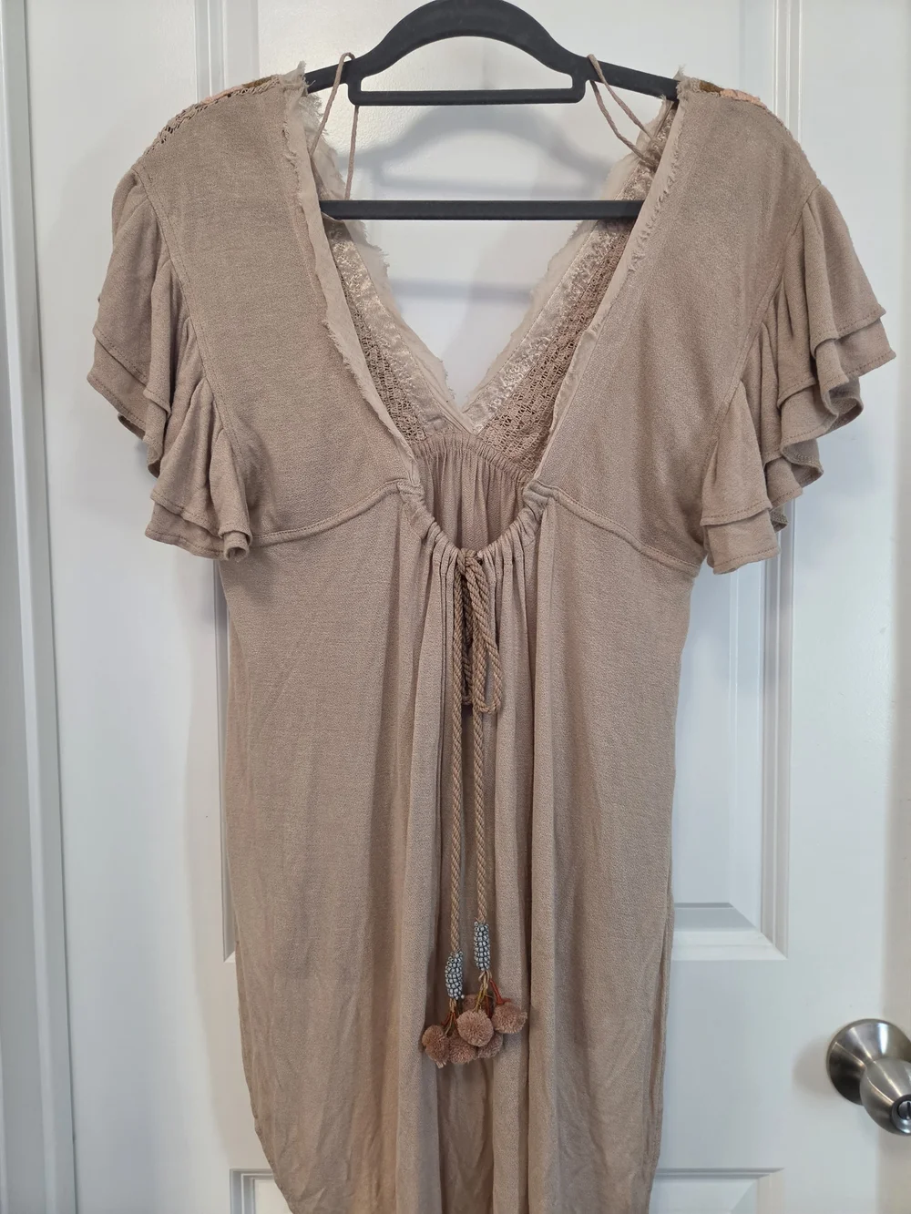 Boho Embroidered V-Neck High-Low Top with Ruffle Sleeves & Back Tie Tassels